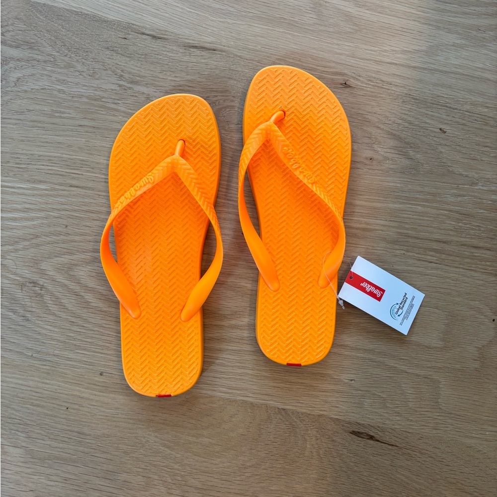 Swalker Women's Orange flip flops new with tags
